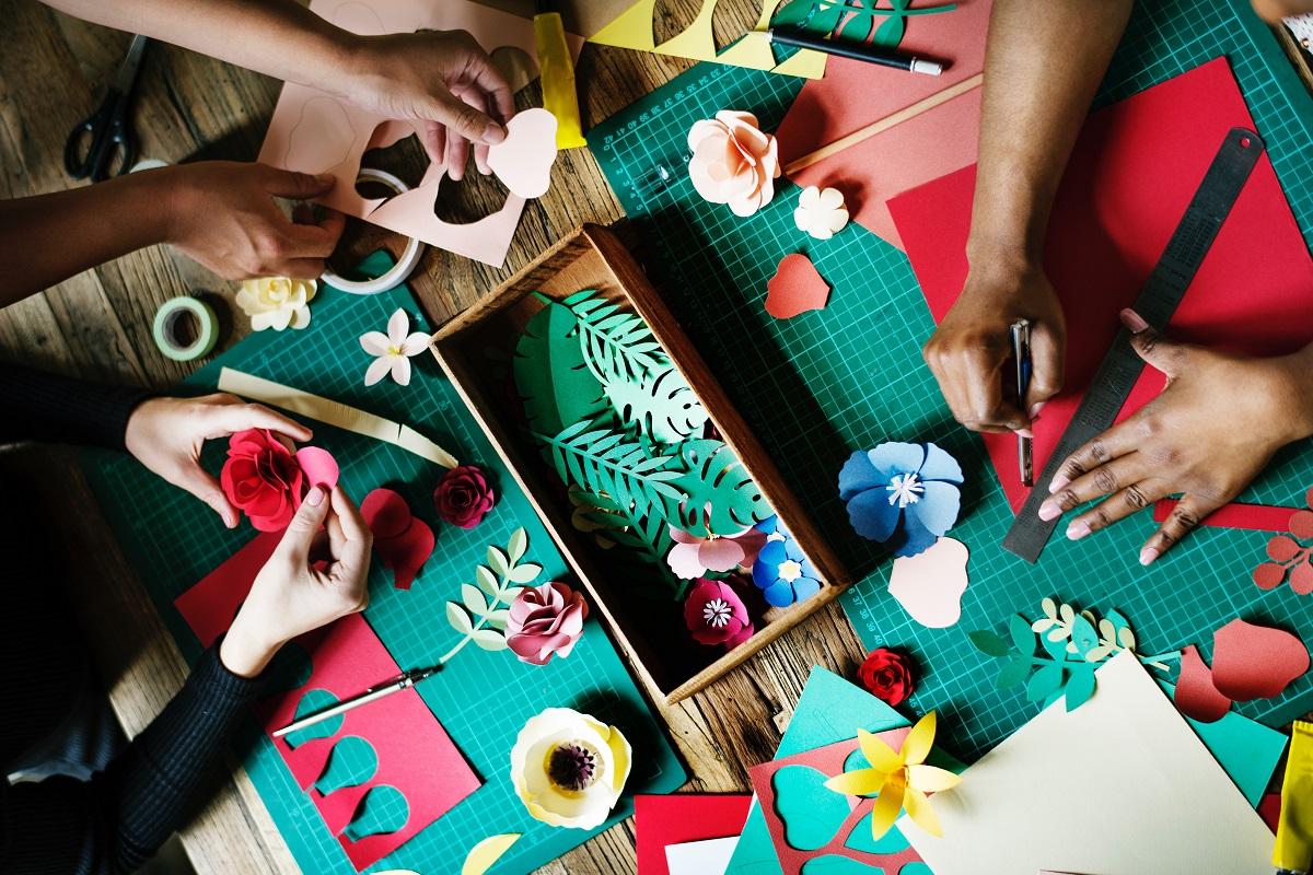 photo of hands working with craft materials